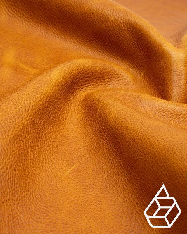 Firm and soft calf leather with a pull-up effect - Cognac | Velo Collection