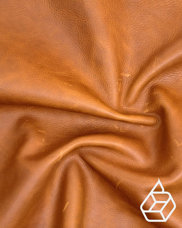 Firm and soft calf leather with a pull-up effect - Cognac | Velo Collection